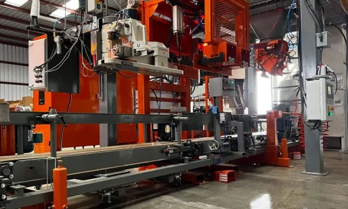 Automatic sewing machine for the packaging industry